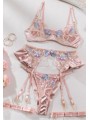 Three-piece sexy lace lingerie set in champagne rose color, floral design, gentle satin material.