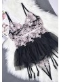 Three-piece  lace sexy lingerie set in black and pink colors, featuring floral design and beautiful skirt like suspender