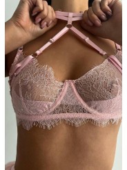 Three-piece sexy lace lingerie set in light pink color featuring suspender with feathers and neck accessory.