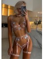 Three-piece sexy lace lingerie set in champagne rose color, floral design, gentle satin material.